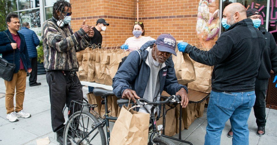 Saval Foodservice and Busboys and Poets donate food to restaurant industry workers affected by the coronavirus outbreak at 14th and V Streets NW, on Friday, April 17, 2020. (Photo:Tom Williams/CQ-Roll Call, Inc via Getty Images)
