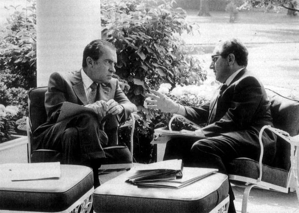 Nixon and Kissinger on a porch
