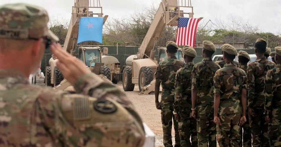 A group of Somalian troops trained by the U.S. military stand at attention at a graduation ceremony. (Photo: U.S. Africa Command)