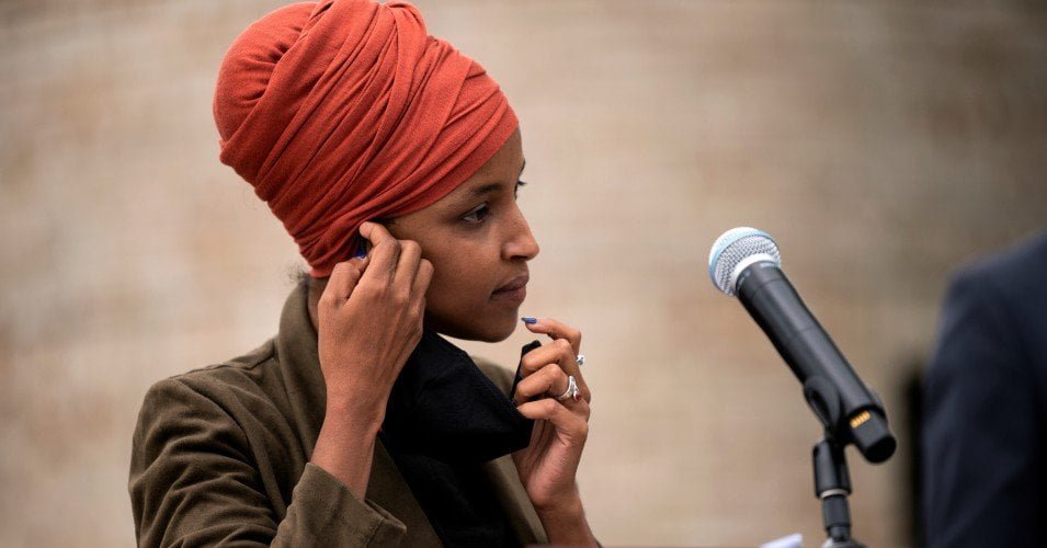 Rep. Ilhan Omar (D-Minn.) removes her mask to speak during a press conference on August 5, 2020 in St Paul, Minnesota.