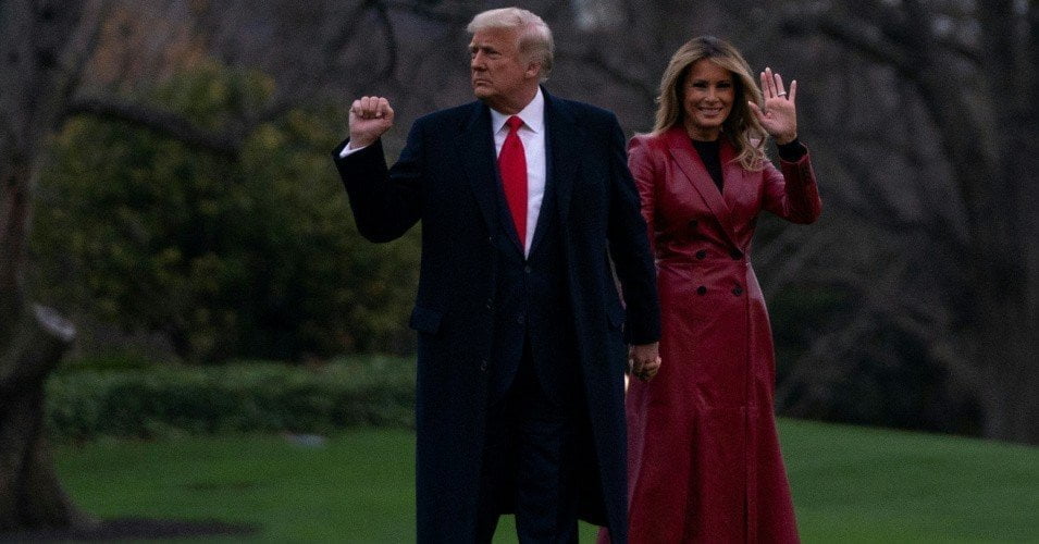 U.S. President Donald Trump and First Lady Melania Trump prepare to board Marine One as they depart the White House on December 5, 2020 in Washington, D.C. (Photo: Alex Edelman/AFP via Getty Images)